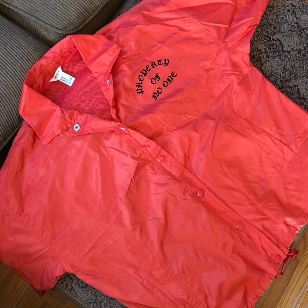 Orange Property of No One Windbreaker